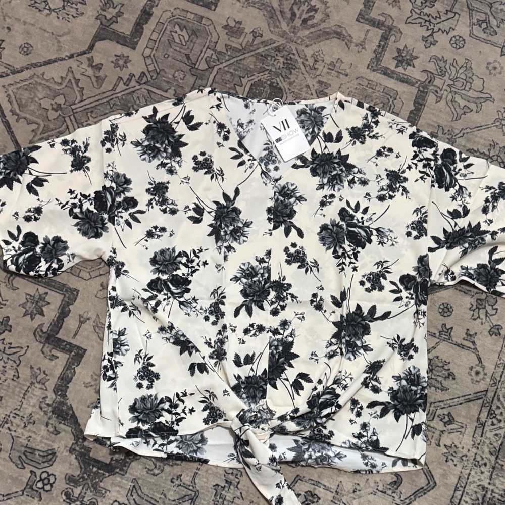 Elegant Black and Cream Floral Blouse